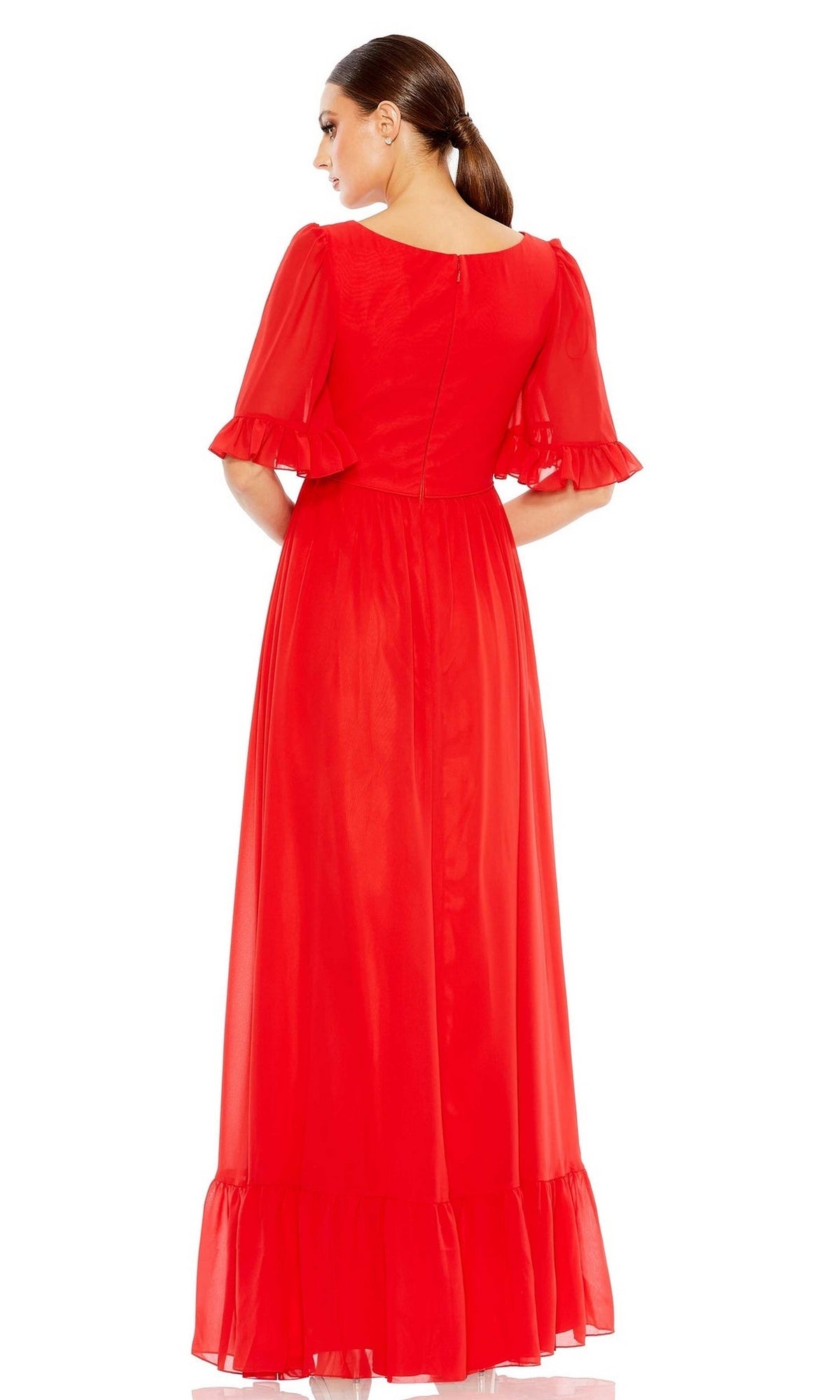 A woman with a low ponytail is seen from the back against a white background wearing the Long Formal Dress 55867 by Mac Duggal in bright red, featuring ruffled short sleeves, a ruffled hem, and an elegant v-neckline.